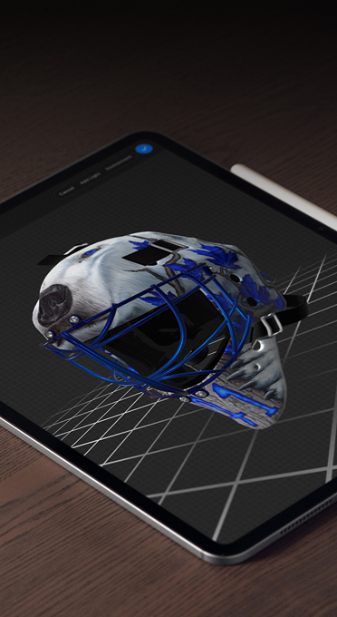 M5 Chip: An iPad with a 3D goalie mask rendering, showing the power of the M5 Chip.