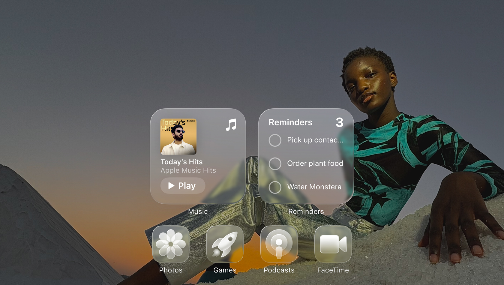 Liquid Glass display with clear app icons, like Apple Music, Reminders, Photos, Games, Podcasts, and FaceTime refracting against the wallpaper