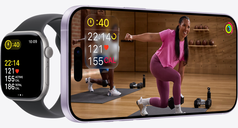Apple Fitness+ app on an iPhone showing a workout with synchronized exercise metrics displayed on an Apple Watch