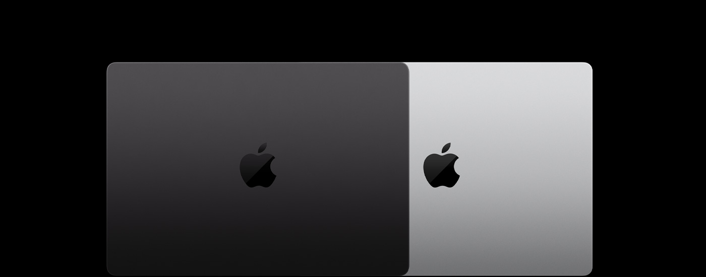 兩部合上的 Mac 手提電腦俯視圖，一部疊放在另一部上面。