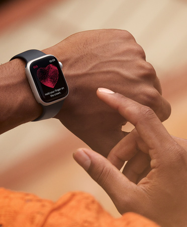 A person uses their Apple Watch Series 11 to take an ECG while on the go