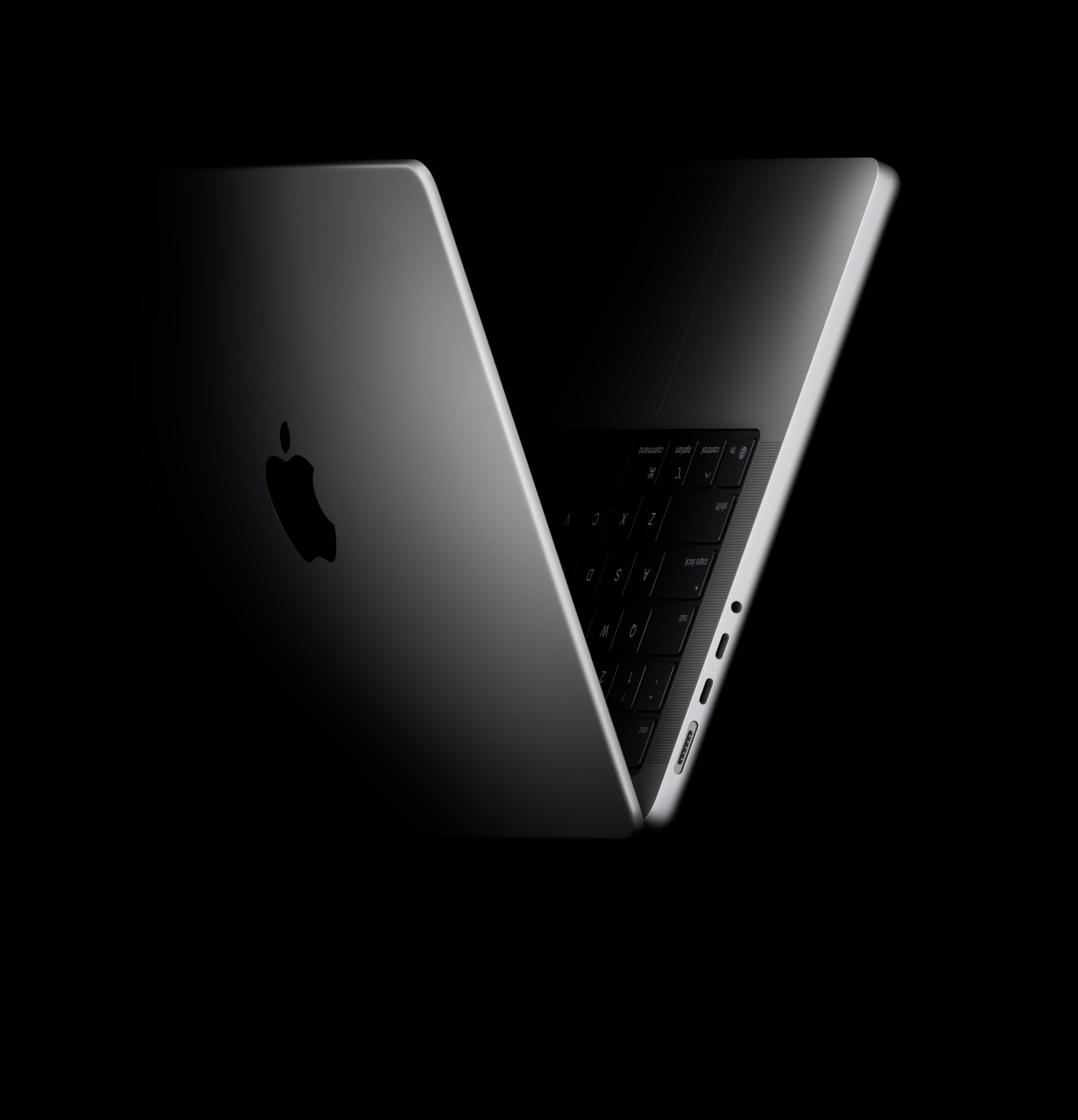 MacBook Pro positioned into the shape of a V, referencing the M5 chip family